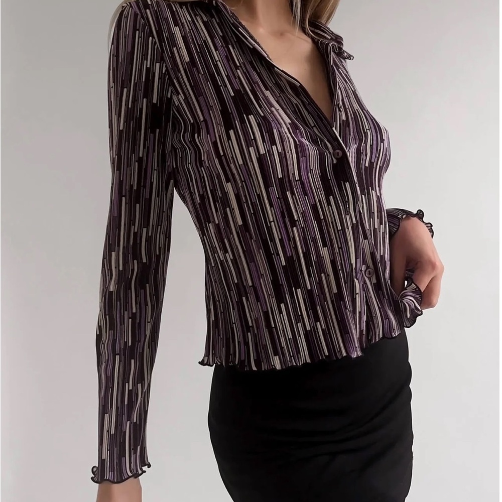 Vintage pleated button down blouse featuring lettuce trim.